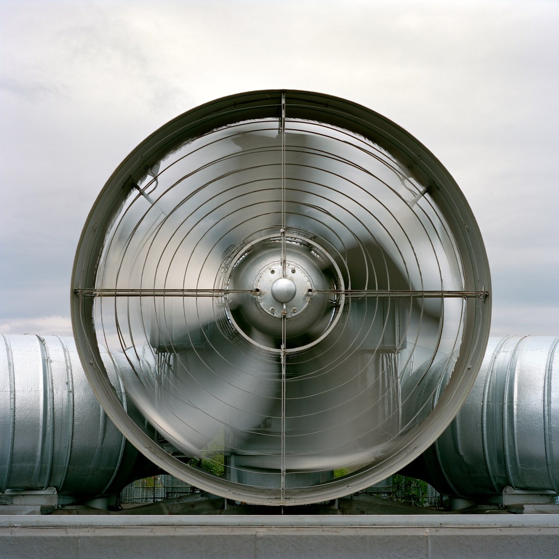 Large industrial rooftop ventilation fan, a loud equipment noise source